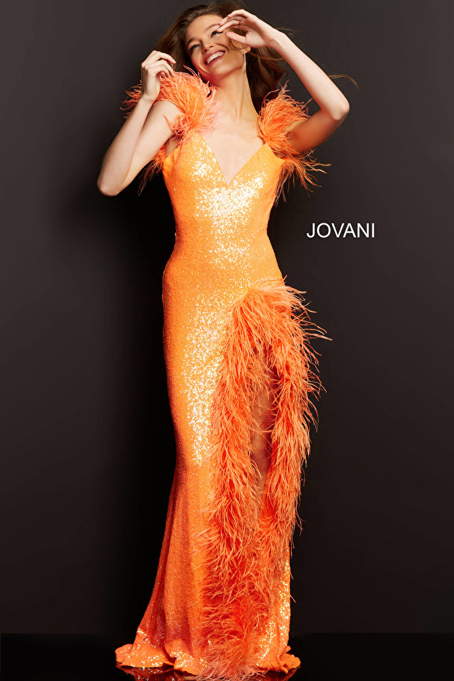 Dazzle everyone in the room with Jovani 06164 Fitted Sequin Prom Dress. This stunning prom dress is the epitome of glamor and sophistication. The floor-length skirt features a train and a high slit trimmed with delicate feathers, adding an ethereal touch to the dress. The sleeveless bodice is adorned with shimmering sequins and features a low V-neckline perfect for showcasing your décolletage. 