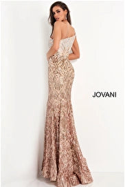 Jovani 06469 is a long fitted formal evening gown. Fully Embellished Sequin Ombre Color shifting geometric patterns. One shoulder Neckline. Mermaid silhouette with a lush trumpet skirt & Sweeping train. Stunning Prom & Pageant Gow