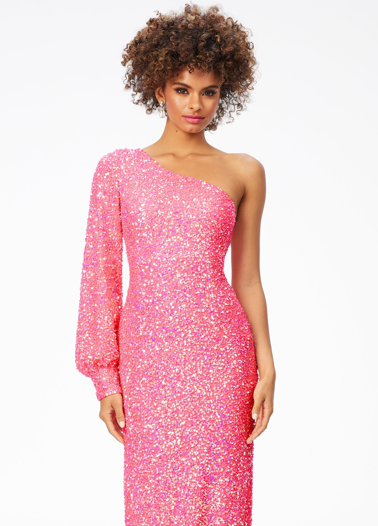 Ashley Lauren 11194  This gorgeous sequin gown features a one shoulder neckline dress features a bishop sleeve and a fitted column skirt with back vent.  Available colors:  Neon Pink, Peacock, Purple, Emerald, Black