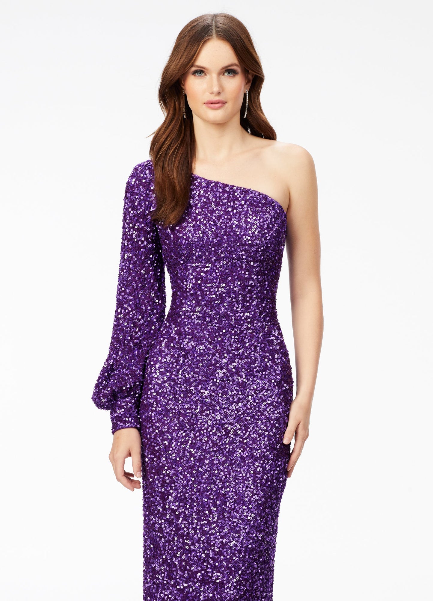 Ashley Lauren 11194  This gorgeous sequin gown features a one shoulder neckline dress features a bishop sleeve and a fitted column skirt with back vent.  Available colors:  Neon Pink, Peacock, Purple, Emerald, Black