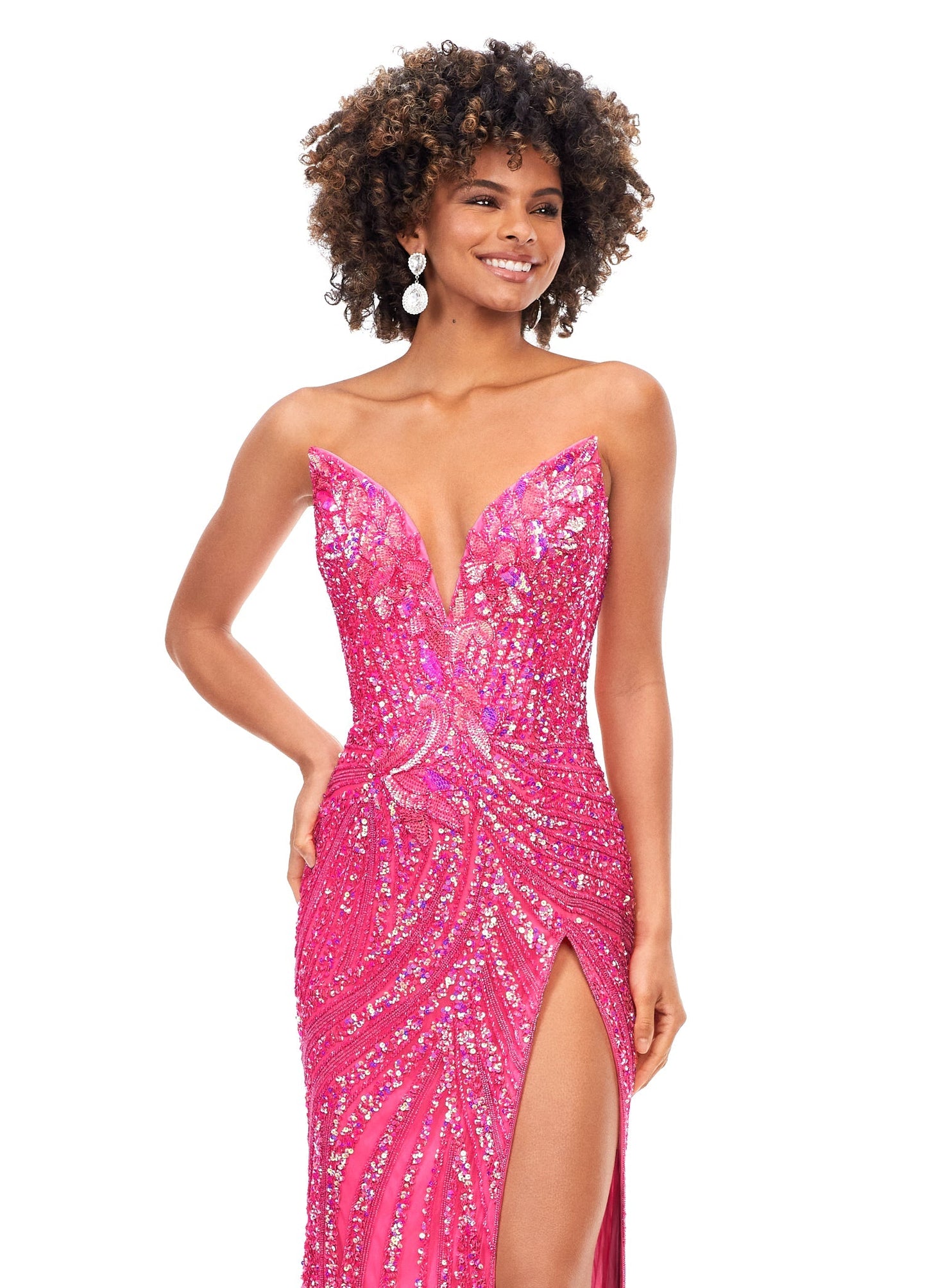 Ashley Lauren 11236 Long Fitted V Neck Slit Beaded Sequin Prom Dress Pageant Gown This strapless gown is sure to turn heads. The sweetheart neckline is complete with a modern floral sequin motif that continues down the bustier and skirt. The skirt is complete with a left leg slit. Strapless Bustier Left Leg Slit Fully Hand Beaded COLORS: Gold, Rose Gold, Gold/Black, Sky/Nude, Gold/Ivory, Fuchsia/Black, Purple, Red, Fuchsia, Bright Pink, Blue/Jade Sizes: 0-16