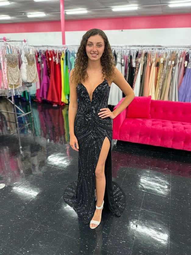 Ashley Lauren 11236 Long Fitted V Neck Slit Beaded Sequin Prom Dress Pageant Gown This strapless gown is sure to turn heads. The sweetheart neckline is complete with a modern floral sequin motif that continues down the bustier and skirt. The skirt is complete with a left leg slit.