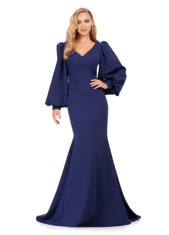 As an industry expert, the Ashley Lauren 11345 Long Prom Dress offers a sophisticated and elegant style suitable for formal occasions. This v-neckline, bishop sleeved gown boasts a stunning silhouette that flatters the wearer's figure. Crafted with high-quality materials, this dress is sure to make a lasting impression. With class and elegance, this beautiful evening gown is sure to stun. This fitted gown features an elegant draped v-neckline. The look is accented with bishop sleeves and a sweep train.