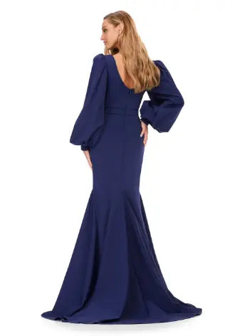 As an industry expert, the Ashley Lauren 11345 Long Prom Dress offers a sophisticated and elegant style suitable for formal occasions. This v-neckline, bishop sleeved gown boasts a stunning silhouette that flatters the wearer's figure. Crafted with high-quality materials, this dress is sure to make a lasting impression. With class and elegance, this beautiful evening gown is sure to stun. This fitted gown features an elegant draped v-neckline. The look is accented with bishop sleeves and a sweep train.