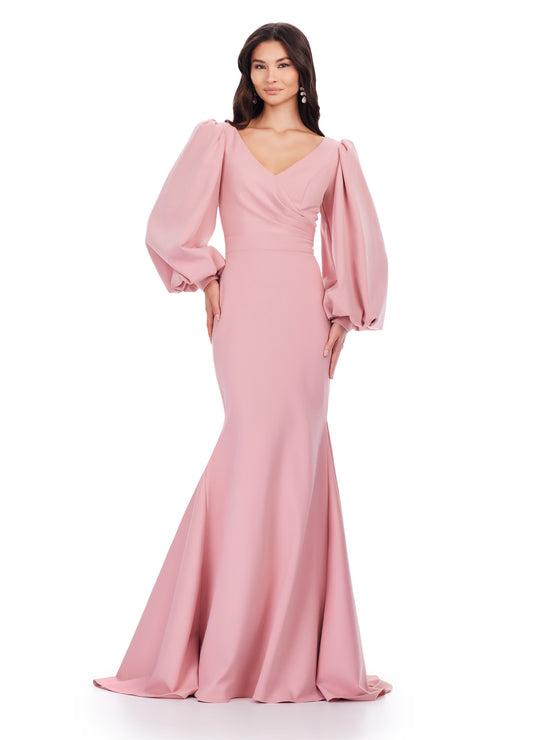 As an industry expert, the Ashley Lauren 11345 Long Prom Dress offers a sophisticated and elegant style suitable for formal occasions. This v-neckline, bishop sleeved gown boasts a stunning silhouette that flatters the wearer's figure. Crafted with high-quality materials, this dress is sure to make a lasting impression. With class and elegance, this beautiful evening gown is sure to stun. This fitted gown features an elegant draped v-neckline. The look is accented with bishop sleeves and a sweep train.