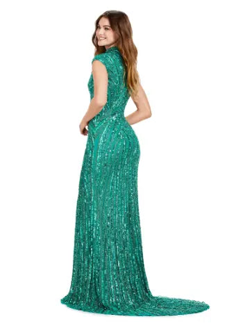 Make a statement in this Ashley Lauren 11395 long prom dress. With its fully beaded bodice and fitted silhouette, it is sure to turn heads. The high neck and center slit add a touch of elegance, making it the perfect choice for a formal event or pageant. This fully sequin dress has an intricate beaded motif that is sure to accentuate your curves. With its elegant high neckline and modest center slit, this dress will have you feeling like royalty!