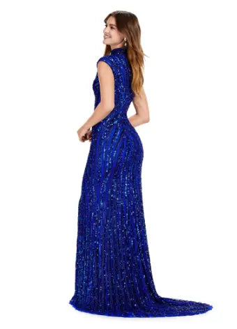 Make a statement in this Ashley Lauren 11395 long prom dress. With its fully beaded bodice and fitted silhouette, it is sure to turn heads. The high neck and center slit add a touch of elegance, making it the perfect choice for a formal event or pageant. This fully sequin dress has an intricate beaded motif that is sure to accentuate your curves. With its elegant high neckline and modest center slit, this dress will have you feeling like royalty!