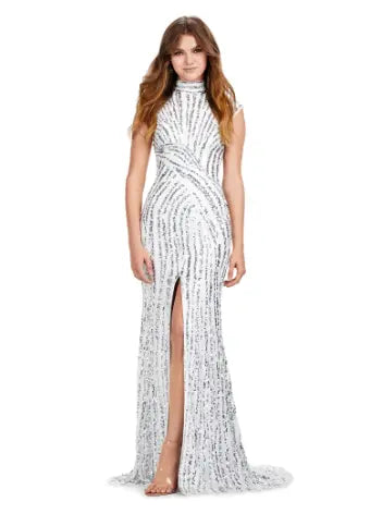 Make a statement in this Ashley Lauren 11395 long prom dress. With its fully beaded bodice and fitted silhouette, it is sure to turn heads. The high neck and center slit add a touch of elegance, making it the perfect choice for a formal event or pageant. This fully sequin dress has an intricate beaded motif that is sure to accentuate your curves. With its elegant high neckline and modest center slit, this dress will have you feeling like royalty!