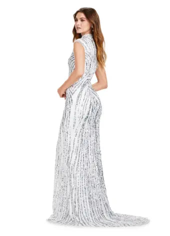 Make a statement in this Ashley Lauren 11395 long prom dress. With its fully beaded bodice and fitted silhouette, it is sure to turn heads. The high neck and center slit add a touch of elegance, making it the perfect choice for a formal event or pageant. This fully sequin dress has an intricate beaded motif that is sure to accentuate your curves. With its elegant high neckline and modest center slit, this dress will have you feeling like royalty!