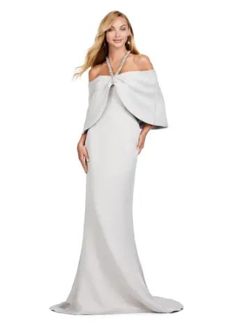 Combining elegance and modern style, the Ashley Lauren 11424 Long Prom Dress is perfect for any formal event. The fitted strapless design flatters your figure, while the oversized off-shoulder bow adds a touch of sophistication. With its stunning overlay and sleek silhouette, this dress will make you stand out in any pageant or evening occasion. Dazzle the crowd with this stunning strapless evening gown. The look is complete with a separate halter style overlay adding elegance to the look.