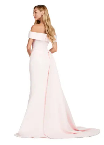 This Ashley Lauren 11425 Long Prom Dress is the perfect choice for any formal occasion. The off-shoulder design adds a touch of elegance, while the fitted satin fabric hugs your figure for a flattering silhouette. The overskirt adds a dramatic flare, making you feel like a pageant queen. Elevate your style with this versatile and stunning dress. An elegant off the shoulder neckline drapes the shoulders in elegant evening gown. The look is complete with beaded details and a side overskirt.