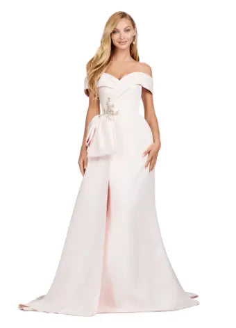 This Ashley Lauren 11425 Long Prom Dress is the perfect choice for any formal occasion. The off-shoulder design adds a touch of elegance, while the fitted satin fabric hugs your figure for a flattering silhouette. The overskirt adds a dramatic flare, making you feel like a pageant queen. Elevate your style with this versatile and stunning dress. An elegant off the shoulder neckline drapes the shoulders in elegant evening gown. The look is complete with beaded details and a side overskirt.