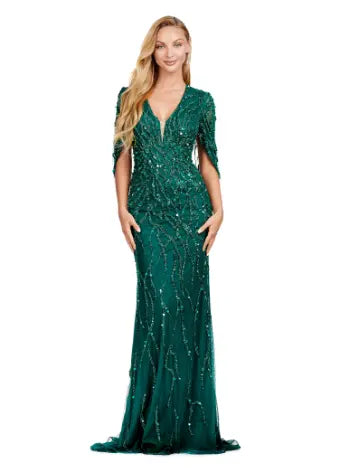 This long prom dress by Ashley Lauren 11430 features a stunning sequin V-neck and elegant cape sleeves, perfect for a formal pageant or evening event. The modern design and quality construction make it a must-have for any fashion-forward individual looking to make a statement. Look and feel confident in this unique, eye-catching gown. 