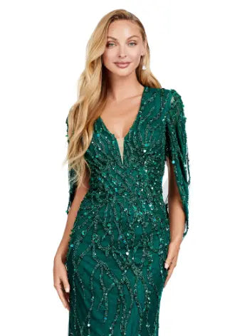 This long prom dress by Ashley Lauren 11430 features a stunning sequin V-neck and elegant cape sleeves, perfect for a formal pageant or evening event. The modern design and quality construction make it a must-have for any fashion-forward individual looking to make a statement. Look and feel confident in this unique, eye-catching gown. 