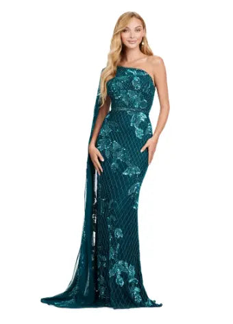 The Ashley Lauren 11434 Long Prom Dress is the epitome of elegance and sophistication. With a one shoulder design, fully beaded gown, and floor length silhouette, this dress will make you feel like a star on any special occasion. The sleeve adds a touch of formality, perfect for pageants or formal events. A twist on a classic. This gorgeous fully beaded gown features a one shoulder floor length sleeve for the perfect touch of drama.  Sizes Available: 0,2,4,6,8,10,12,14,16,18,20,22,24