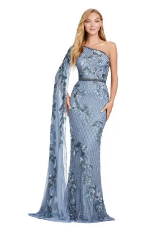 The Ashley Lauren 11434 Long Prom Dress is the epitome of elegance and sophistication. With a one shoulder design, fully beaded gown, and floor length silhouette, this dress will make you feel like a star on any special occasion. The sleeve adds a touch of formality, perfect for pageants or formal events. A twist on a classic. This gorgeous fully beaded gown features a one shoulder floor length sleeve for the perfect touch of drama.  Sizes Available: 0,2,4,6,8,10,12,14,16,18,20,22,24