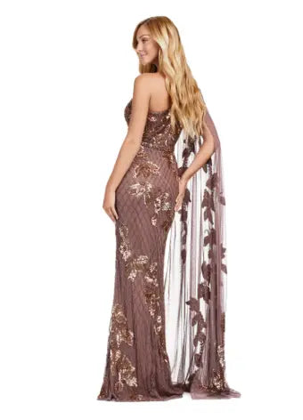 The Ashley Lauren 11434 Long Prom Dress is the epitome of elegance and sophistication. With a one shoulder design, fully beaded gown, and floor length silhouette, this dress will make you feel like a star on any special occasion. The sleeve adds a touch of formality, perfect for pageants or formal events. A twist on a classic. This gorgeous fully beaded gown features a one shoulder floor length sleeve for the perfect touch of drama.  Sizes Available: 0,2,4,6,8,10,12,14,16,18,20,22,24