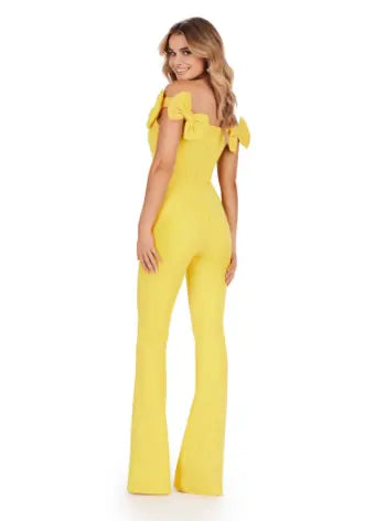 Introducing the Ashley Lauren 11439 Formal Scuba Jumpsuit, featuring a beautiful off shoulder design with elegant bow details. Made with high-quality scuba fabric, this jumpsuit offers a comfortable and sleek fit for any prom or formal occasion. Show off your fashion-forward style with this must-have piece. Strike a pose in this fun-fashion scuba jumpsuit! With the cutest off shoulder bow sleeves, this piece will give you the confidence you need at any event!