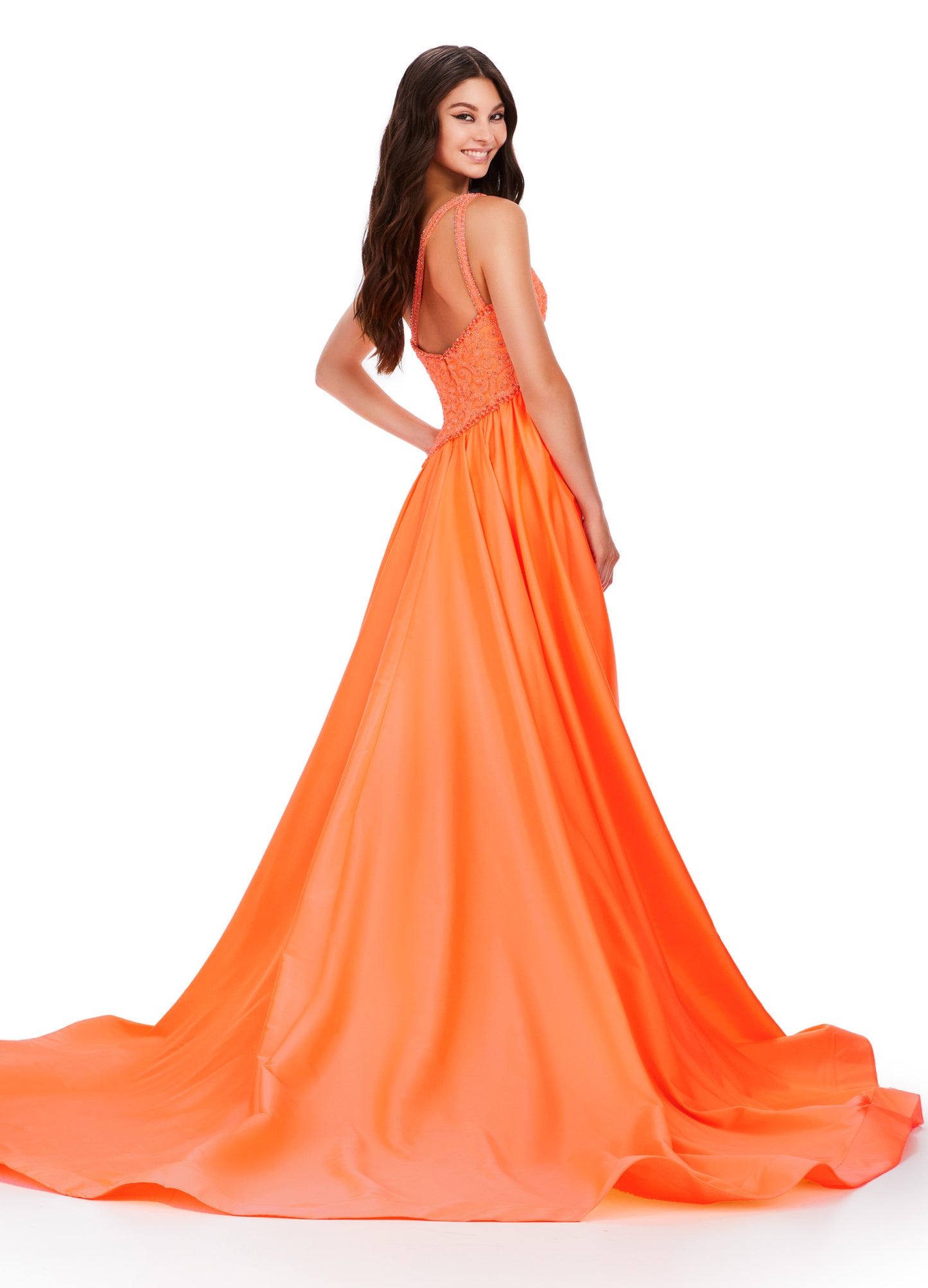 This Ashley Lauren 11456 Long Prom Dress features a one shoulder design with a beautiful taffeta fabric and a stunning beaded bodice. Elevate your formal look with this pageant-worthy gown. Expertly crafted with attention to detail, this dress is sure to make a statement. A dress sure to make you feel like royalty! This one shoulder gown features a fully beaded bodice and a dramatic taffeta overskirt.