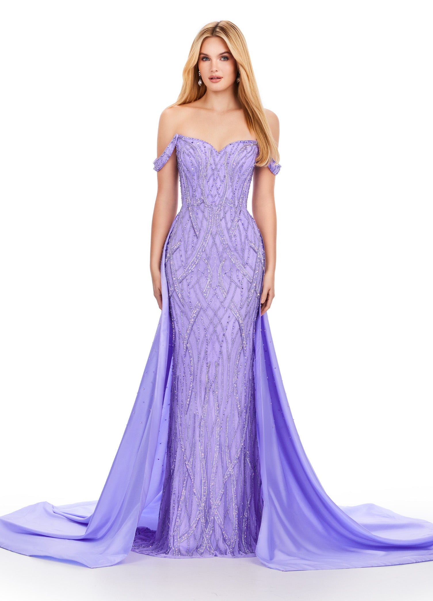 Elevate your evening look with the Ashley Lauren 11458 Long Prom Dress. This fully beaded strapless gown features a flattering off shoulder neckline and a unique draping taffeta overskirt. Perfect for formal occasions and pageants. Regal and fabulous? We got you. This fully beaded gown features an off shoulder sweetheart neckline and a dramatic taffeta overskirt to help you slay at your next event.