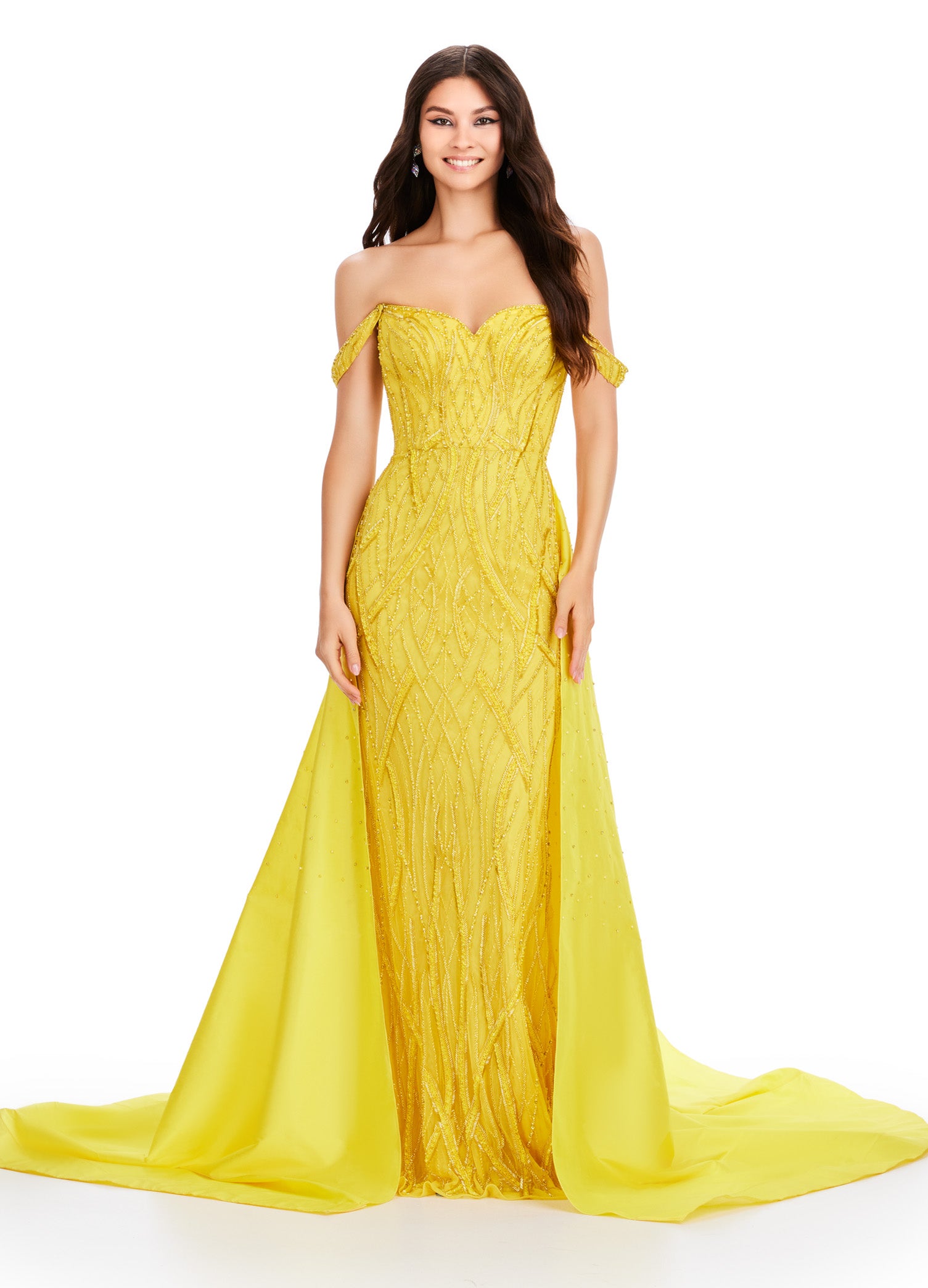 Elevate your evening look with the Ashley Lauren 11458 Long Prom Dress. This fully beaded strapless gown features a flattering off shoulder neckline and a unique draping taffeta overskirt. Perfect for formal occasions and pageants. Regal and fabulous? We got you. This fully beaded gown features an off shoulder sweetheart neckline and a dramatic taffeta overskirt to help you slay at your next event.