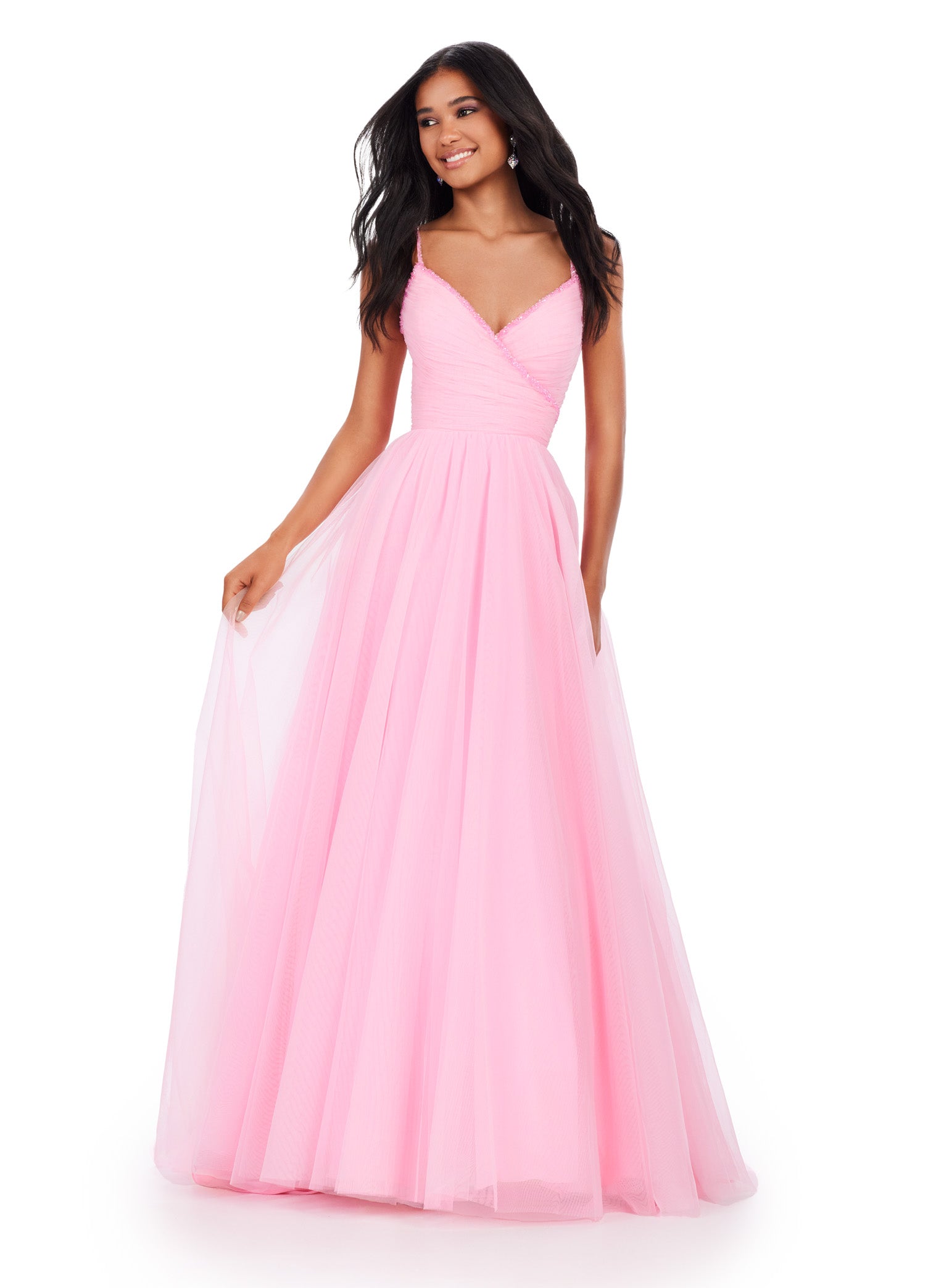 The Ashley Lauren 11461 Long Prom Dress is the perfect choice for your formal occasion. This elegant gown features delicate spaghetti straps and a tulle ball gown skirt for a timeless look. The intricate beaded detailing adds a touch of sparkle, making you stand out from the crowd. Experience the ultimate in luxury with this pageant-worthy dress. This simplistic ball gown features dainty beaded spaghetti straps with a ruched bodice.