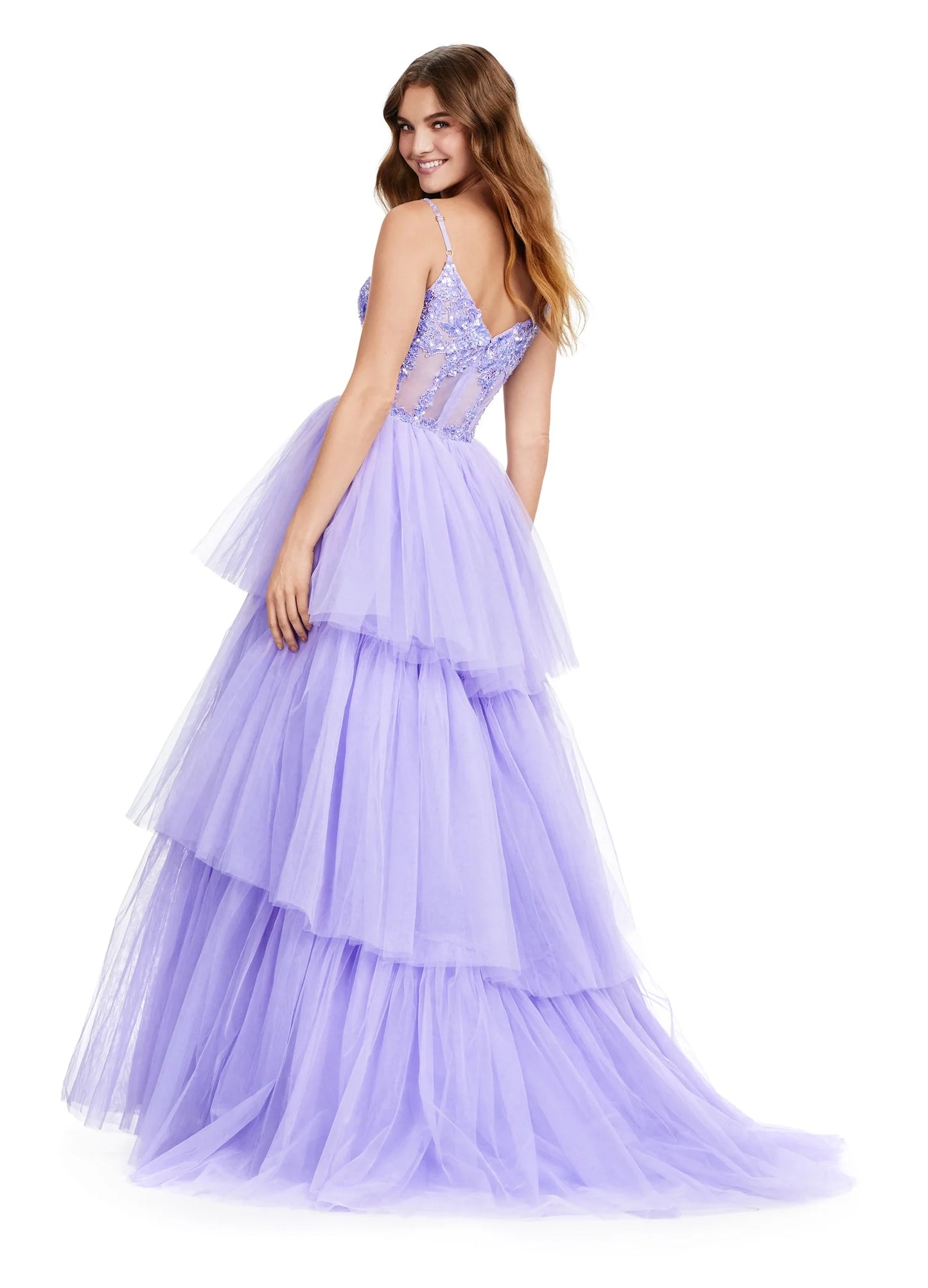 The Ashley Lauren 11462 Sheer Beaded Corset Layer Tulle Prom Dress Ballgown Pageant Tiered Gown is a statement-making piece. Crafted from sheer corset layers, delicate beadwork, and tiered tulle, it's perfect for any special occasion. Elegant and eye-catching, this dress features the perfect balance of comfort and sophistication.