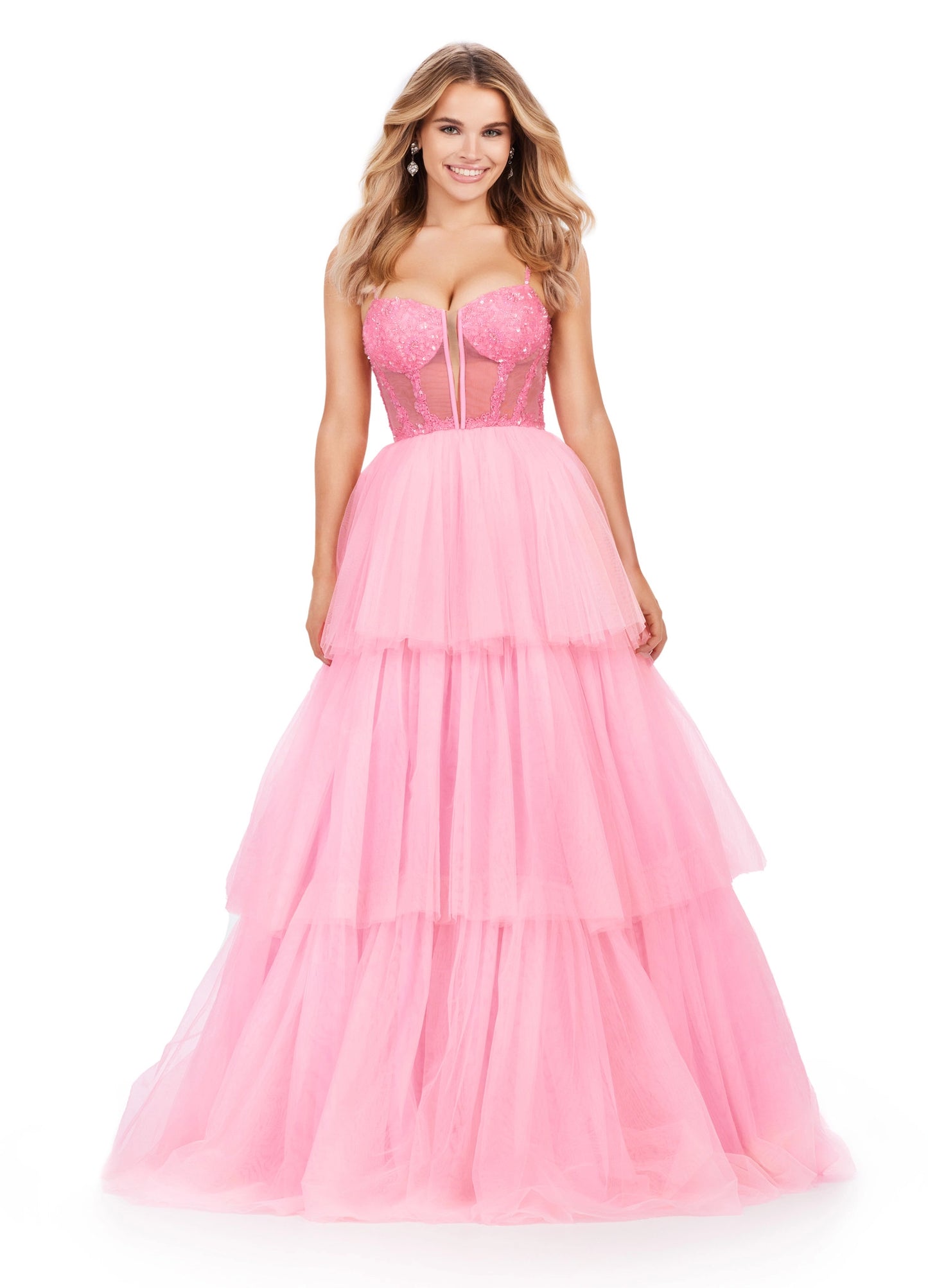 The Ashley Lauren 11462 Sheer Beaded Corset Layer Tulle Prom Dress Ballgown Pageant Tiered Gown is a statement-making piece. Crafted from sheer corset layers, delicate beadwork, and tiered tulle, it's perfect for any special occasion. Elegant and eye-catching, this dress features the perfect balance of comfort and sophistication.