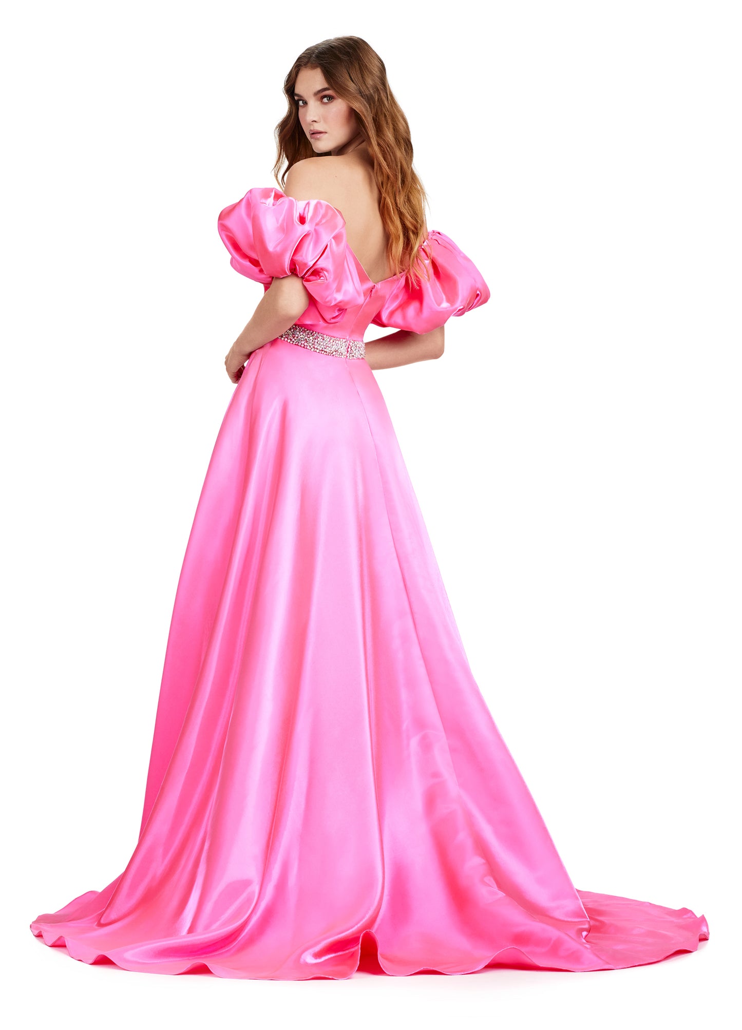 Elevate your formal look with the Ashley Lauren 11474 Long Prom Dress. This elegant strapless satin ball gown boasts a beaded belt, detachable puff sleeves, and a timeless pageant-style design. Perfect for making a statement at any event, this dress exudes sophistication and style. Be memorable in this strapless satin ball gown. This dress features a beaded belt detail, a left leg slit and detachable puff sleeves.