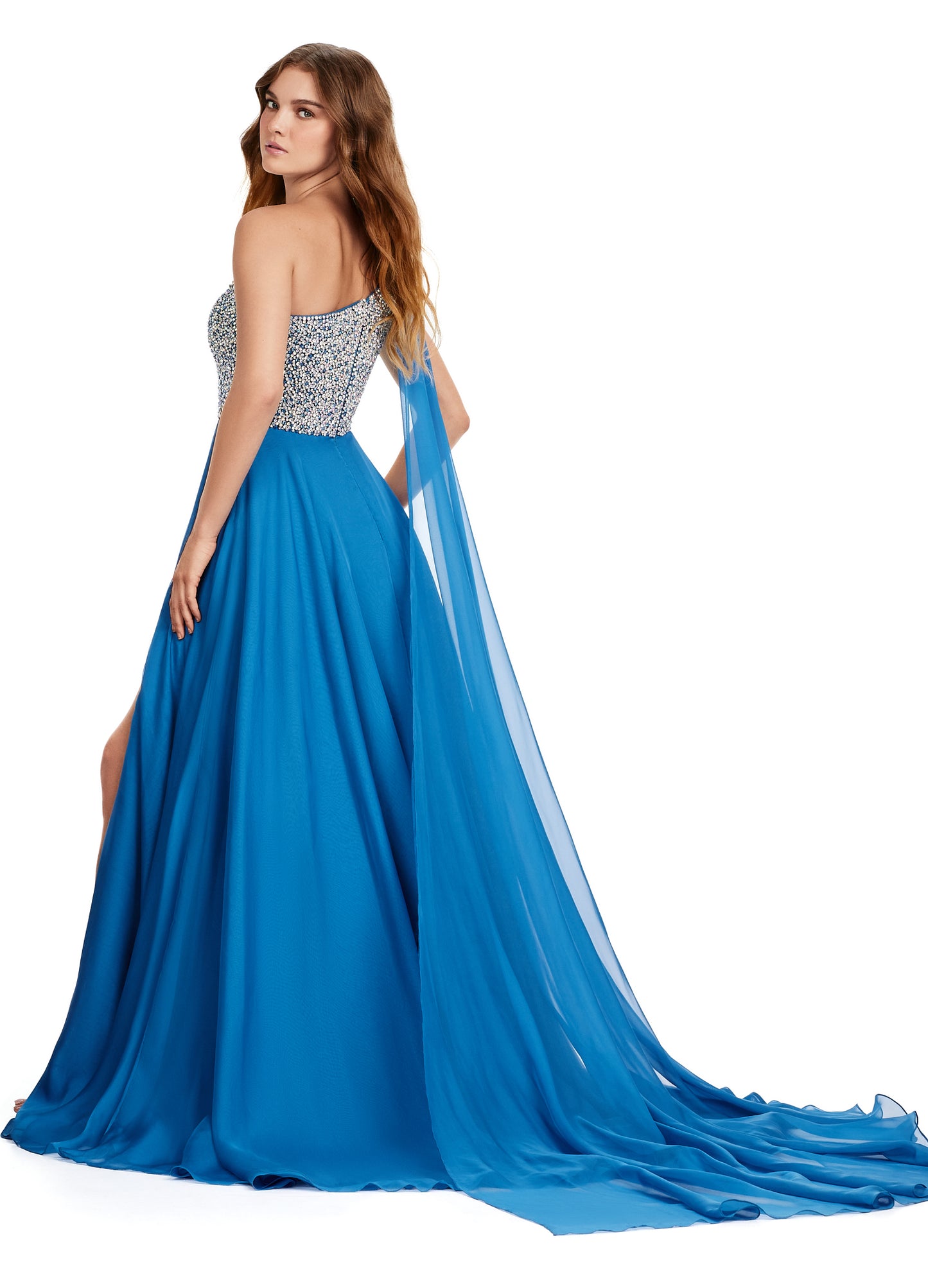 Introducing the show-stopping Ashley Lauren 11482 Long Prom Dress! This elegant gown features a one-shoulder design and flowing chiffon fabric, perfect for any formal occasion. The stunning beaded bustier adds a touch of sparkle and glamour, making you the center of attention. Elevate your style with this must-have pageant gown. A dress fit for a queen!