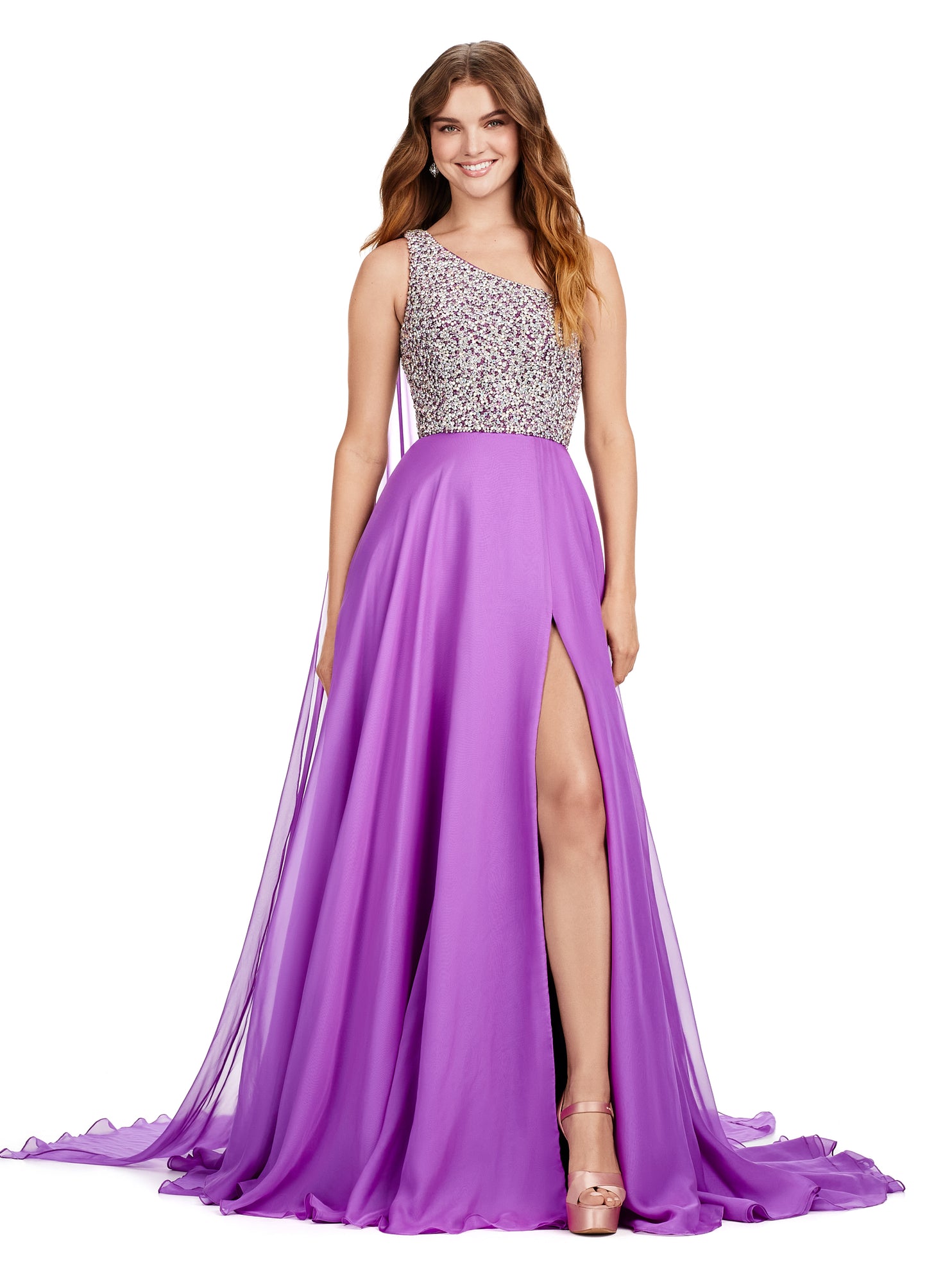 Introducing the show-stopping Ashley Lauren 11482 Long Prom Dress! This elegant gown features a one-shoulder design and flowing chiffon fabric, perfect for any formal occasion. The stunning beaded bustier adds a touch of sparkle and glamour, making you the center of attention. Elevate your style with this must-have pageant gown. A dress fit for a queen!