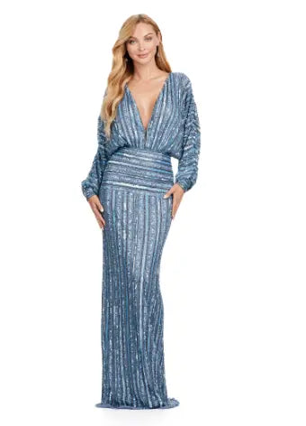 Be the star of any event with the Ashley Lauren 11490 Long Prom Dress. Its stunning V-neck, sequin detailing, and dolman sleeves add the perfect touch of glamour. This elegant evening gown is also perfect for formal events, pageants, and more. Make a statement with this timeless and sophisticated piece. Fun and fabulous! This elegant, fully beaded gown features a v-neckline and dolman sleeves to give the perfect amount of glam at your next event.