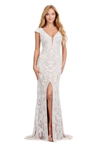 Elevate your formal style with the Ashley Lauren 11497 Fully Beaded V-Neck Evening Gown. The intricate beading, cap sleeves, and center slit create a stunning silhouette that will surely make a statement. Perfect for special occasions, this gown exudes elegance and sophistication. This fully beaded gown is perfect for your next event. This elegant dress features cap sleeves and a V-Neckline with a center slit to compliment the look.