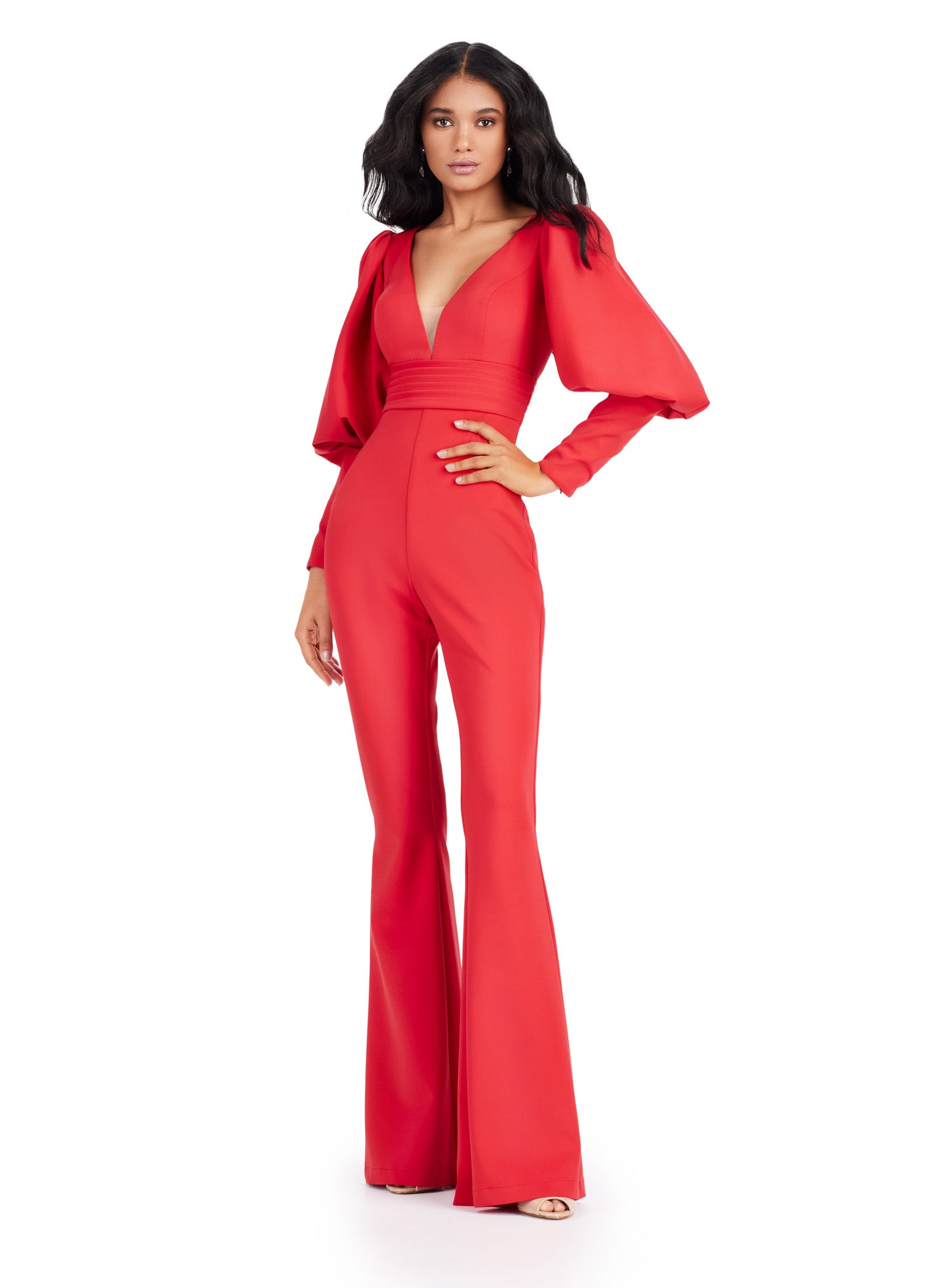 As a leading expert in formal attire, Ashley Lauren presents the 11533 Prom V-Neck Scuba Jumpsuit with Bishop Sleeves. Made from high-quality scuba fabric, this jumpsuit features a flattering V-neckline and bishop sleeves for added elegance. Perfect for any formal event, this jumpsuit exudes sophistication and style. his striking scuba jumpsuit features a v-neckline and bishop sleeves.