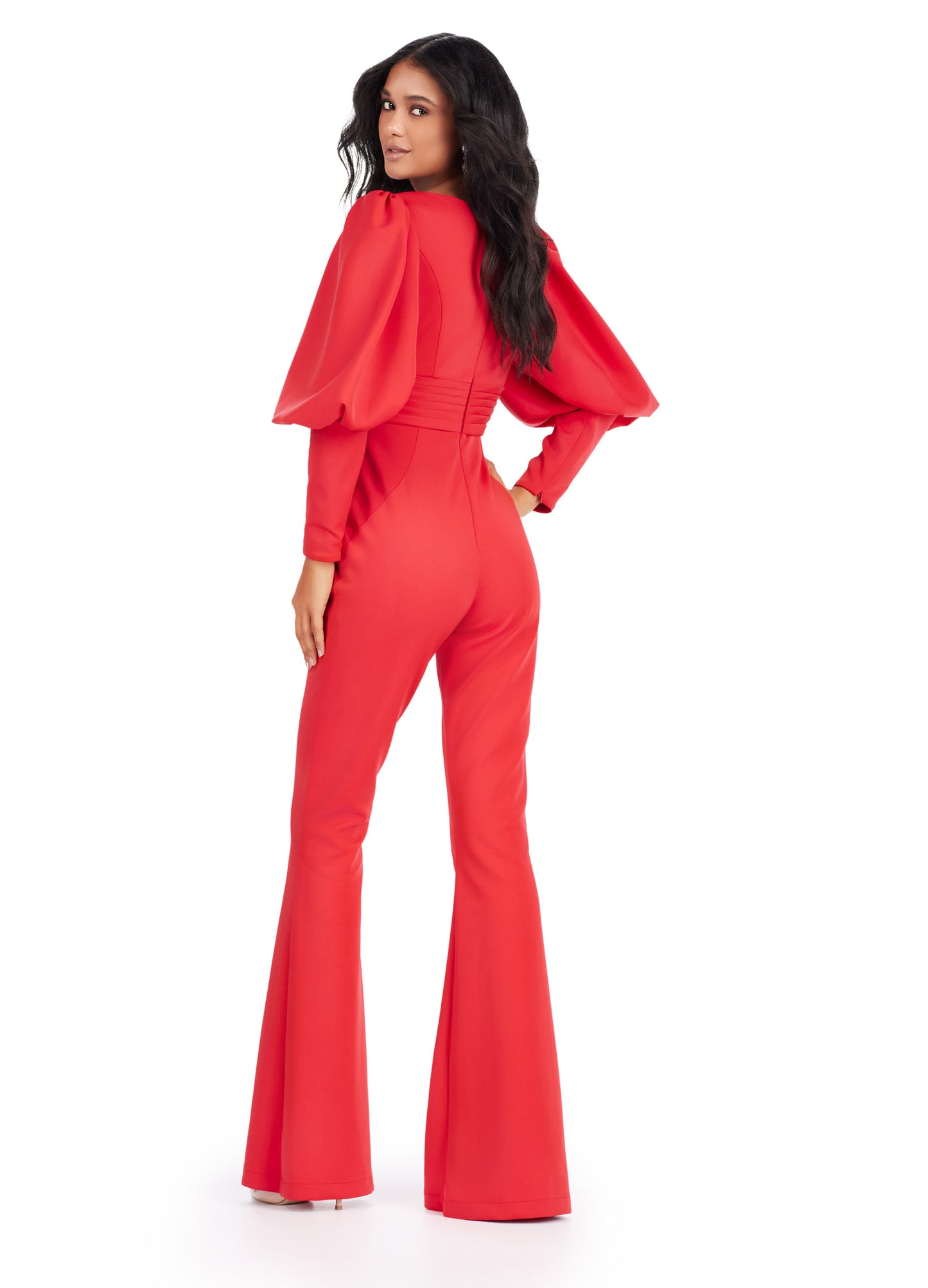 As a leading expert in formal attire, Ashley Lauren presents the 11533 Prom V-Neck Scuba Jumpsuit with Bishop Sleeves. Made from high-quality scuba fabric, this jumpsuit features a flattering V-neckline and bishop sleeves for added elegance. Perfect for any formal event, this jumpsuit exudes sophistication and style. his striking scuba jumpsuit features a v-neckline and bishop sleeves.