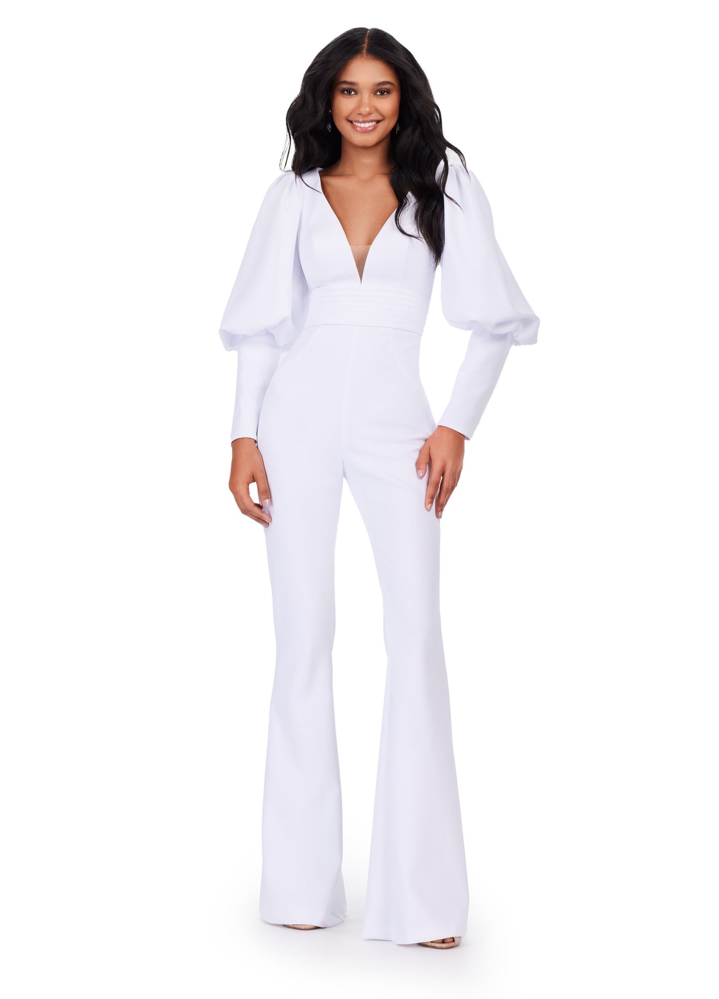 As a leading expert in formal attire, Ashley Lauren presents the 11533 Prom V-Neck Scuba Jumpsuit with Bishop Sleeves. Made from high-quality scuba fabric, this jumpsuit features a flattering V-neckline and bishop sleeves for added elegance. Perfect for any formal event, this jumpsuit exudes sophistication and style. his striking scuba jumpsuit features a v-neckline and bishop sleeves.