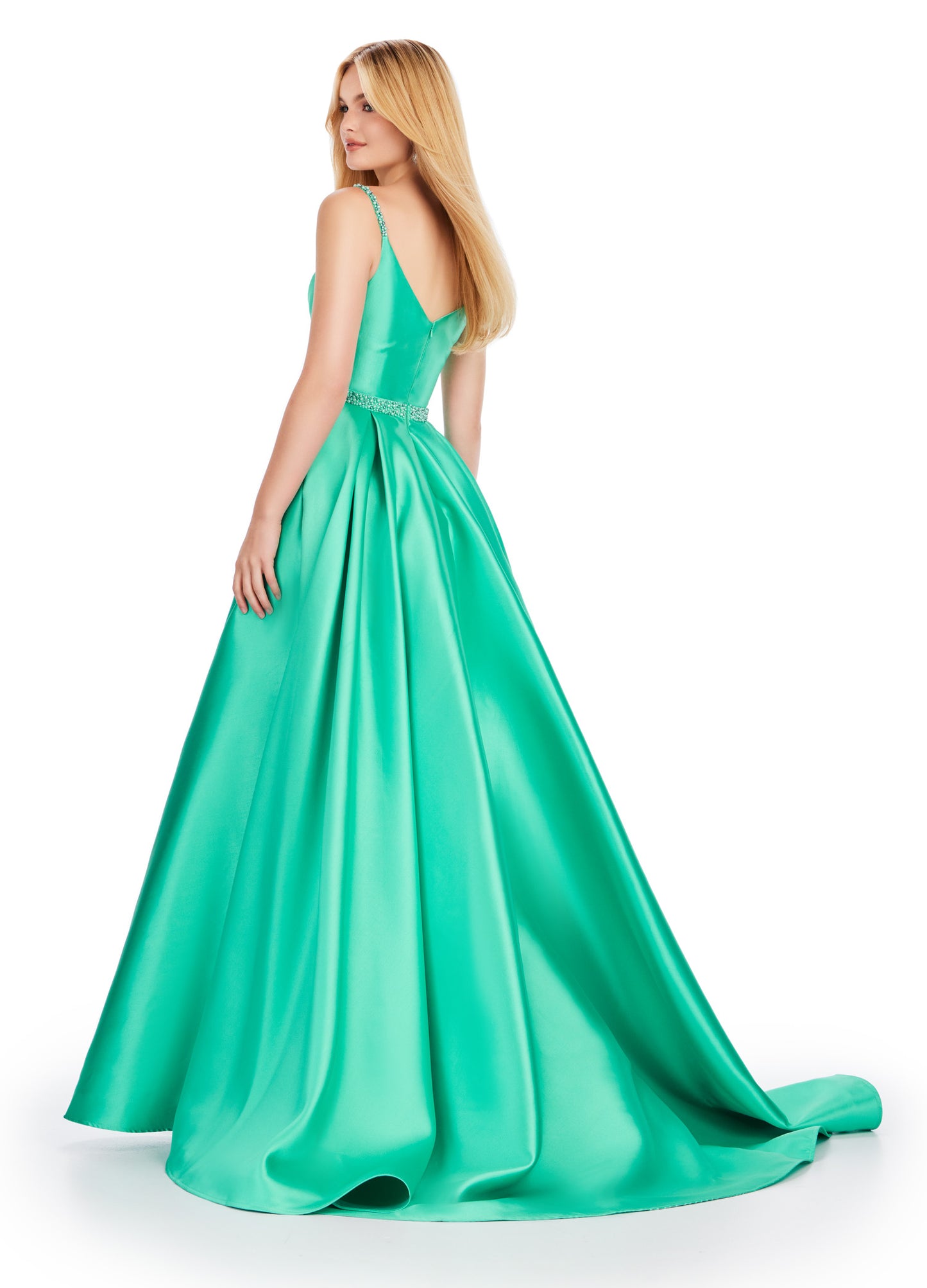 Be the belle of the ball in the Ashley Lauren 11540 Long Prom Dress. This elegant spaghetti strap mikado ball gown features beaded straps and a flattering belt, perfect for your next formal event or pageant. Expertly designed for a stunning and sophisticated look. Dare to be remembered in this one shoulder gown with elegant draping. The fitted skirt is complete with a side skirt that is sure to turn heads. The unique lace up back is sure to provide an exceptional fit.