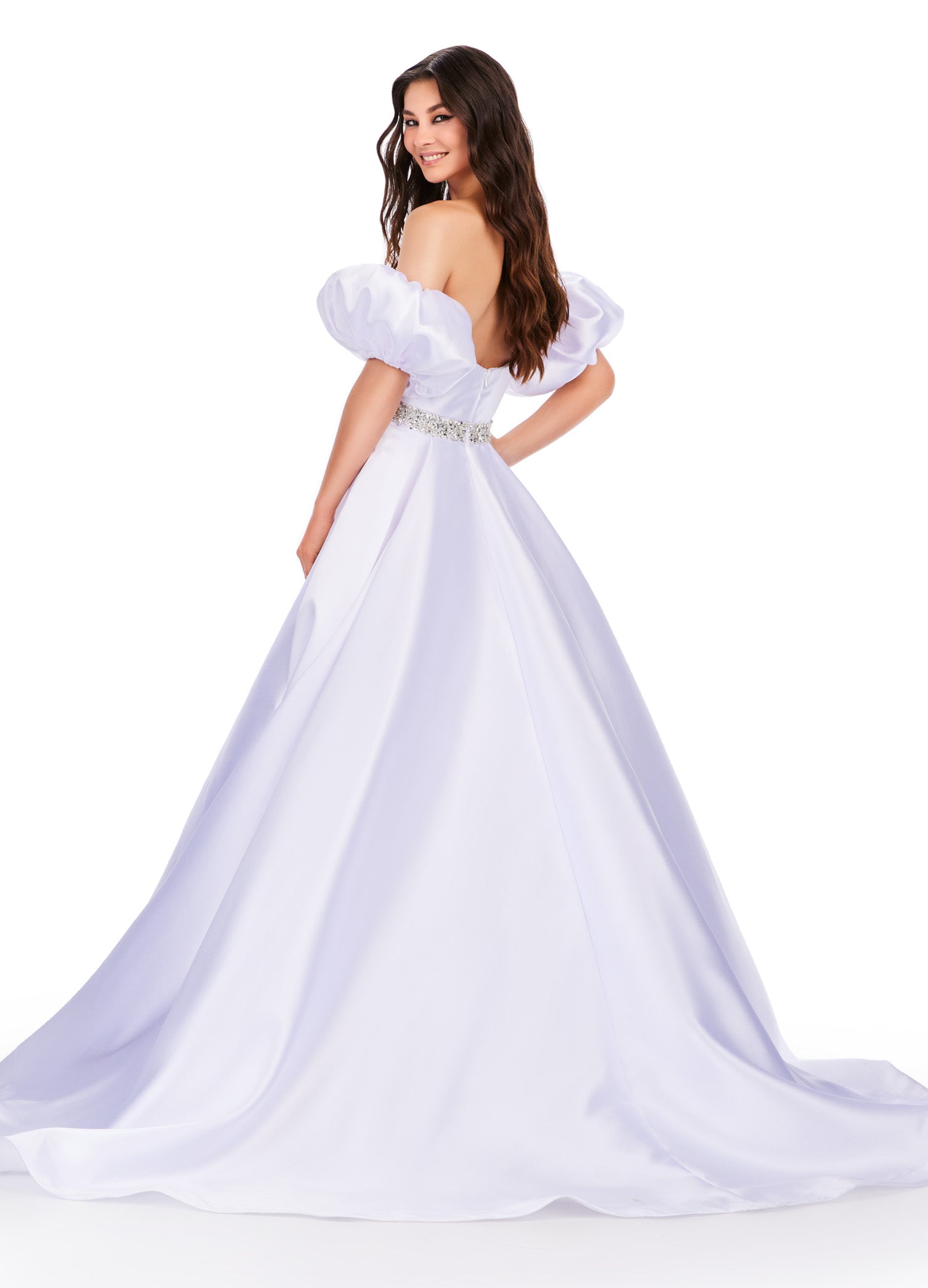 Elevate your formal look with the Ashley Lauren 11543 Long Prom Dress. The off-shoulder, puff sleeve design exudes elegance while the Mikado ball gown silhouette adds drama. Perfect for proms, pageants, and other formal occasions. his classic strapless Mikado ball gown features a beaded waist band. The look is complete with detachable puff sleeves.