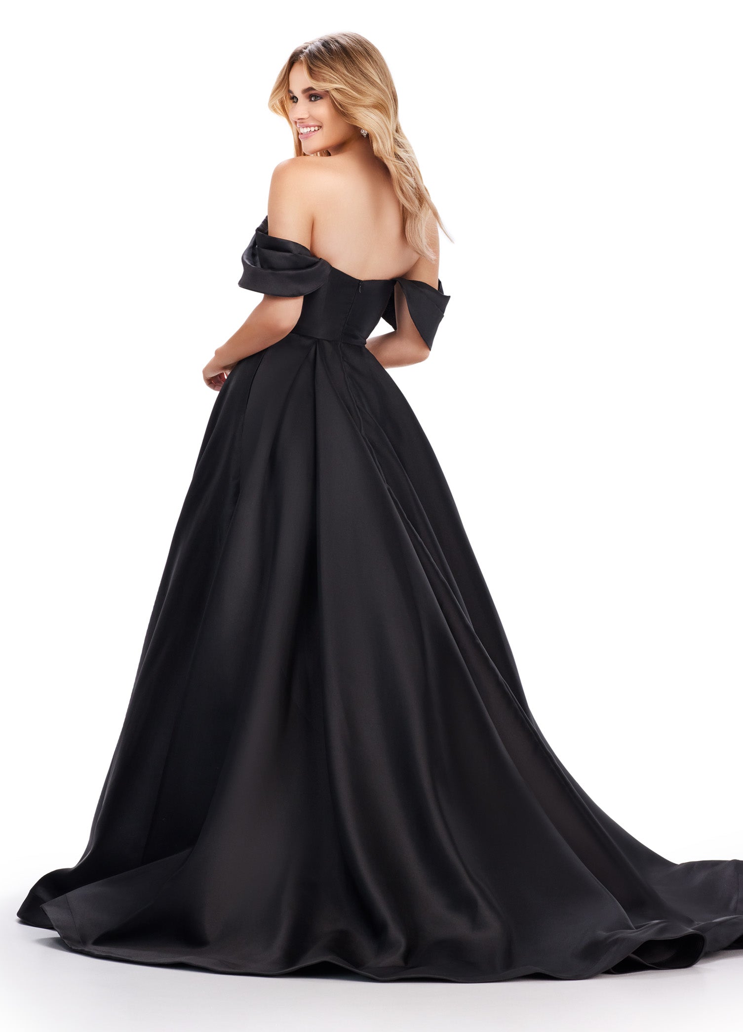 Expertly designed by Ashley Lauren, this stunning Prom Dress features an elegant off the shoulder neckline and a full ballgown skirt. Crafted with Mikado fabric, this formal evening gown exudes sophistication and style. Perfect for any special occasion, this dress is sure to make you stand out with its timeless design and impeccable fit. An off shoulder gown perfect for any event. This Mikado ball gown features a pleated off shoulder detail.