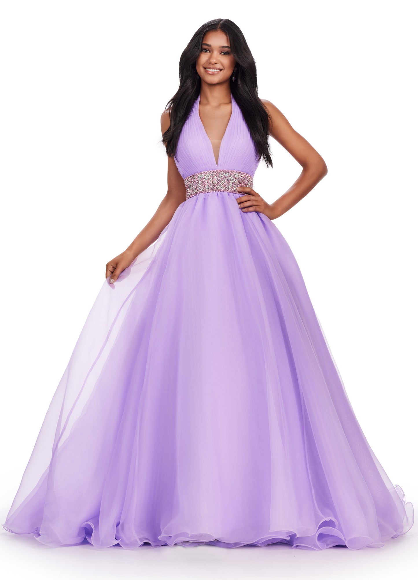 Expertly designed by Ashley Lauren, this formal pageant gown features a beautiful organza ball gown and a stunning beaded belt. Its delicate fabric and intricate details exude elegance, making it the perfect choice for any special occasion. Stand out and feel confident in this long prom dress. Turn heads in this v-neckline organza ball gown with wide fully encrusted crystal waistline. The look is complete with wire hem details.