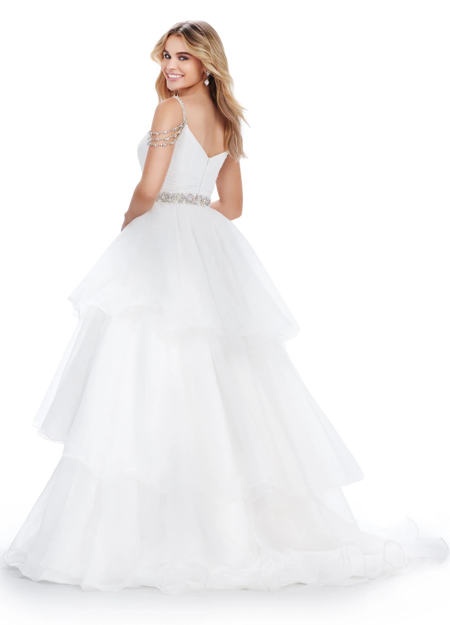 The Ashley Lauren 11561 is the perfect formal dress for prom, pageants, and galas. Featuring off-the-shoulder straps, a crystal embellished bodice, and tiered organza long layer skirt, this gown will ensure you make a statement. Enjoy a comfortable and stylish night in this elegant gown. 