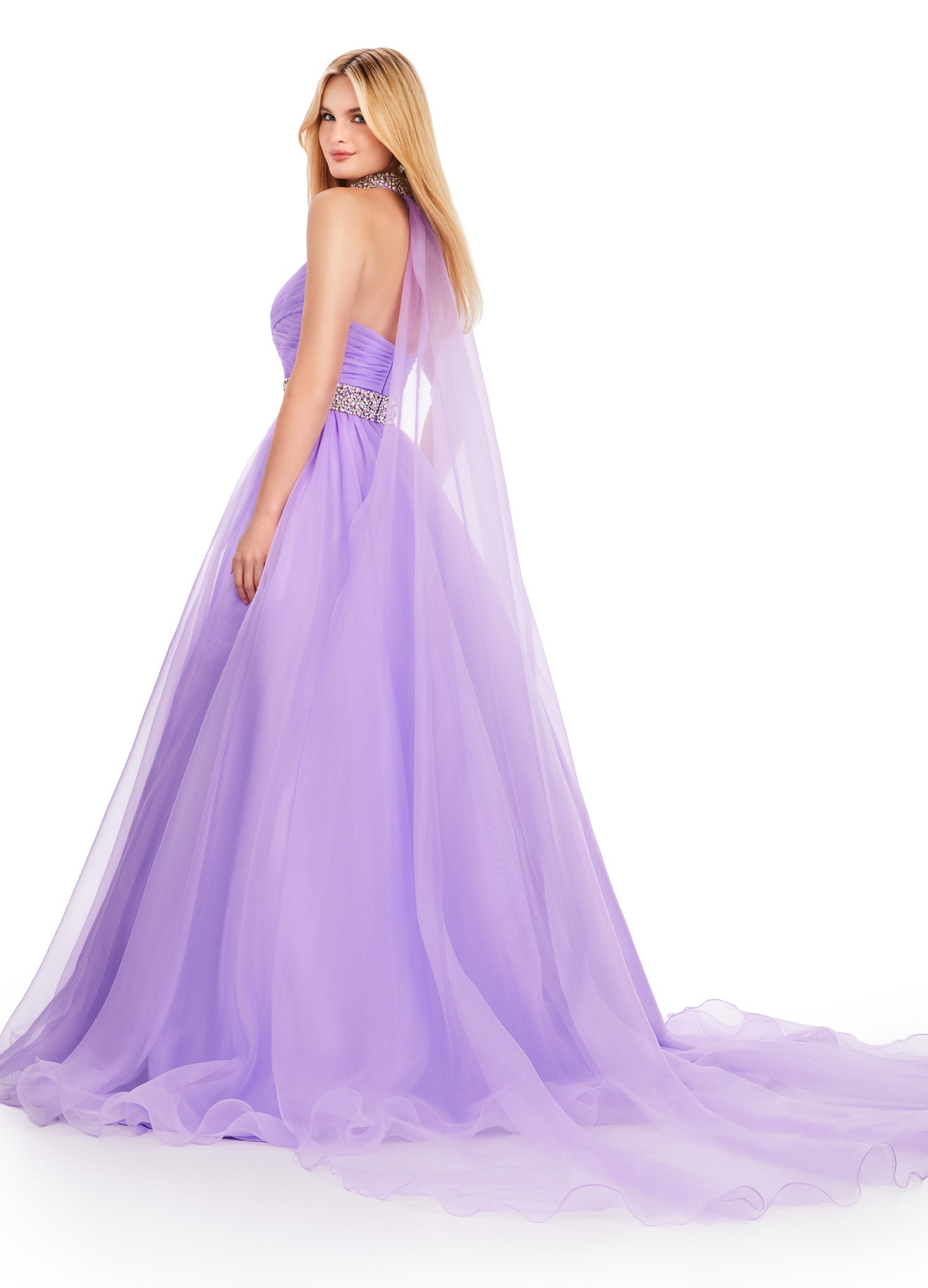 The Ashley Lauren 11565 Long Prom Dress is a stunning organza ball gown that features a beaded choker and a flowing cape, perfect for formal events or pageants. With its intricate beading and elegant design, this dress will make you feel like a true princess. A dress sure to make you feel like a queen. This strapless organza ball gown features a beaded waist band. The look is finished with a beaded choker and organza cape.