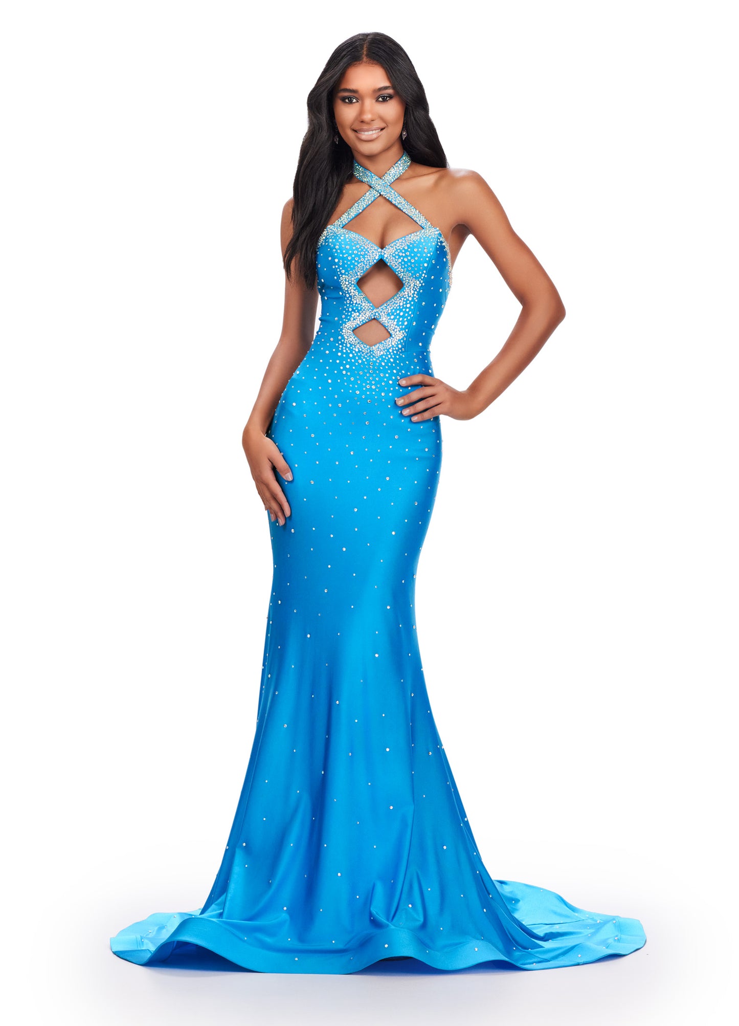 Be the star of the prom with the Ashley Lauren 11578 Long Prom Dress. Designed with a mermaid silhouette and cut-outs, this elegant gown is made of high-quality jersey fabric. The dress also features press on stones, adding a touch of glamour. Perfect for formal events and pageants. Dance the night away in this edgy and fabulous jersey gown. This dress features a halter design with cut outs and press on stones make this dress stand out.