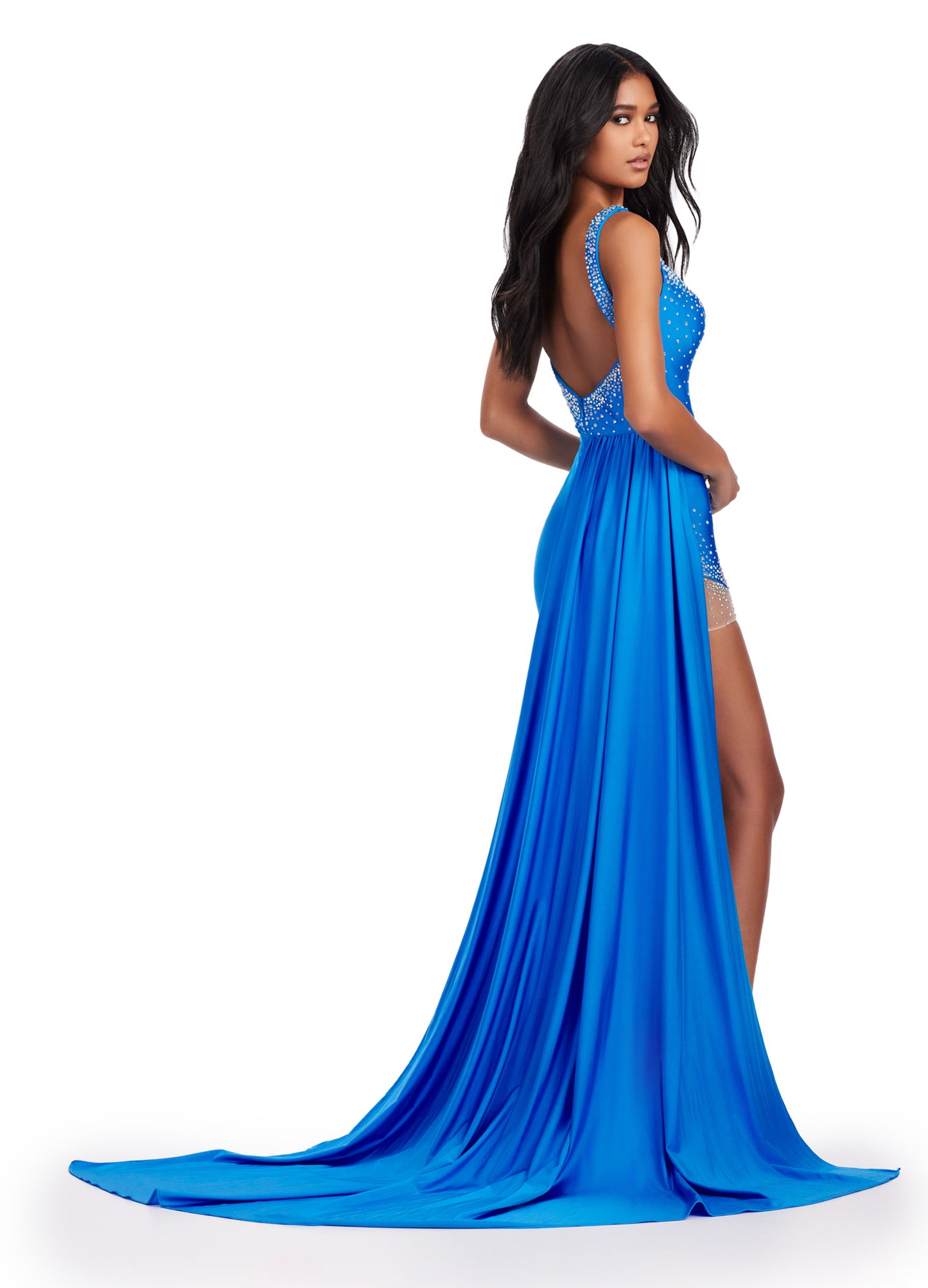 Elevate your formal look with the Ashley Lauren 11579 Long Prom Dress. Made with jersey fabric, this gown features press-on stones and a side skirt slit for added glamour. Perfect for pageants or prom, this dress will make you stand out on any occasion.This unique jersey gown features press on stones and a fabulous side skirt. Perfect for your next event!