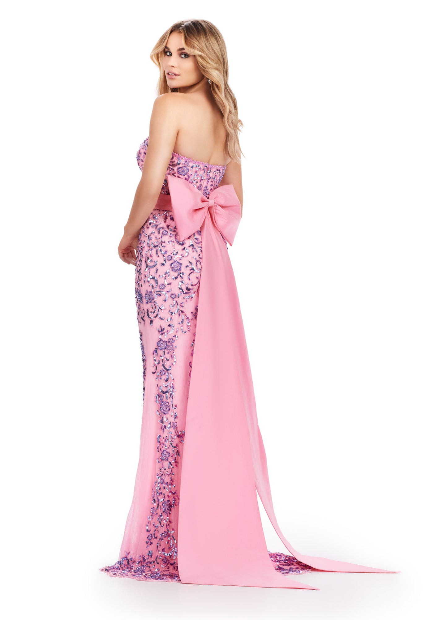 The Ashley Lauren 11583 Long Prom Dress is the perfect choice for any formal occasion. Its strapless design and fully beaded taffeta fabric create a stunning silhouette, while the included belt and bow add elegant finishing touches. Look and feel like a pageant queen in this exquisite gown. Who doesn't love a good bow moment? This strapless, fully beaded gown features an intricate beaded design and a taffeta belt and oversized bow.