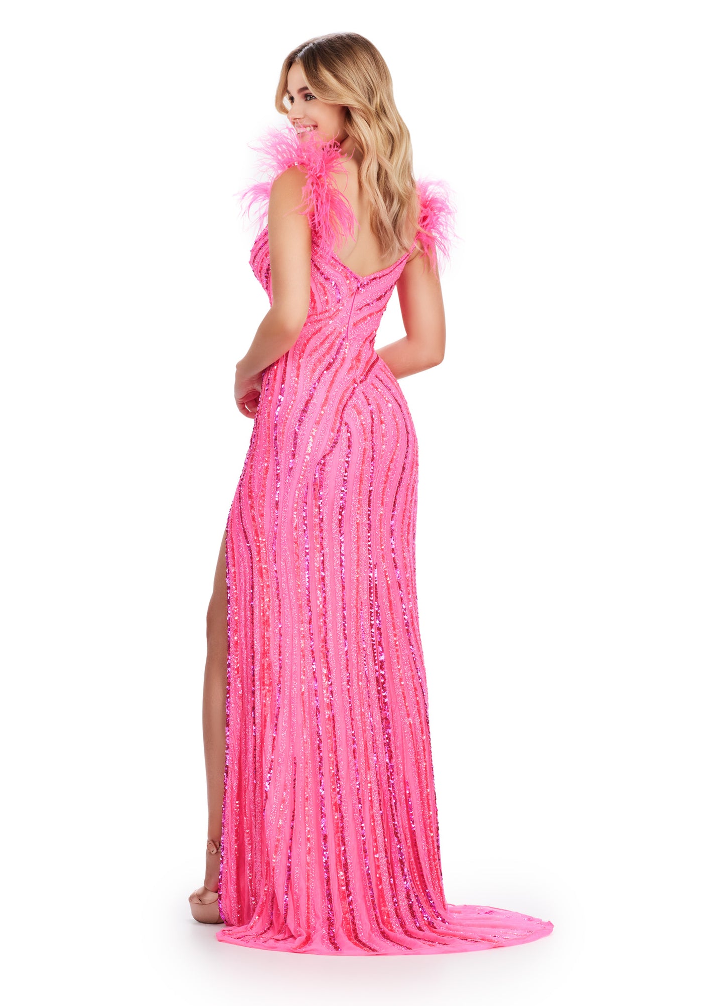 Elevate your style with the Ashley Lauren 11586 Long Prom Dress. This fully beaded dress features feather straps and a formal, pageant-worthy design. With its exquisite detailing and elegant silhouette, this dress will make you stand out and feel confident at your next special event. So glam! This style features a v-neckline complete with feather shoulder details. Intricate beading is scattered throughout the gown.