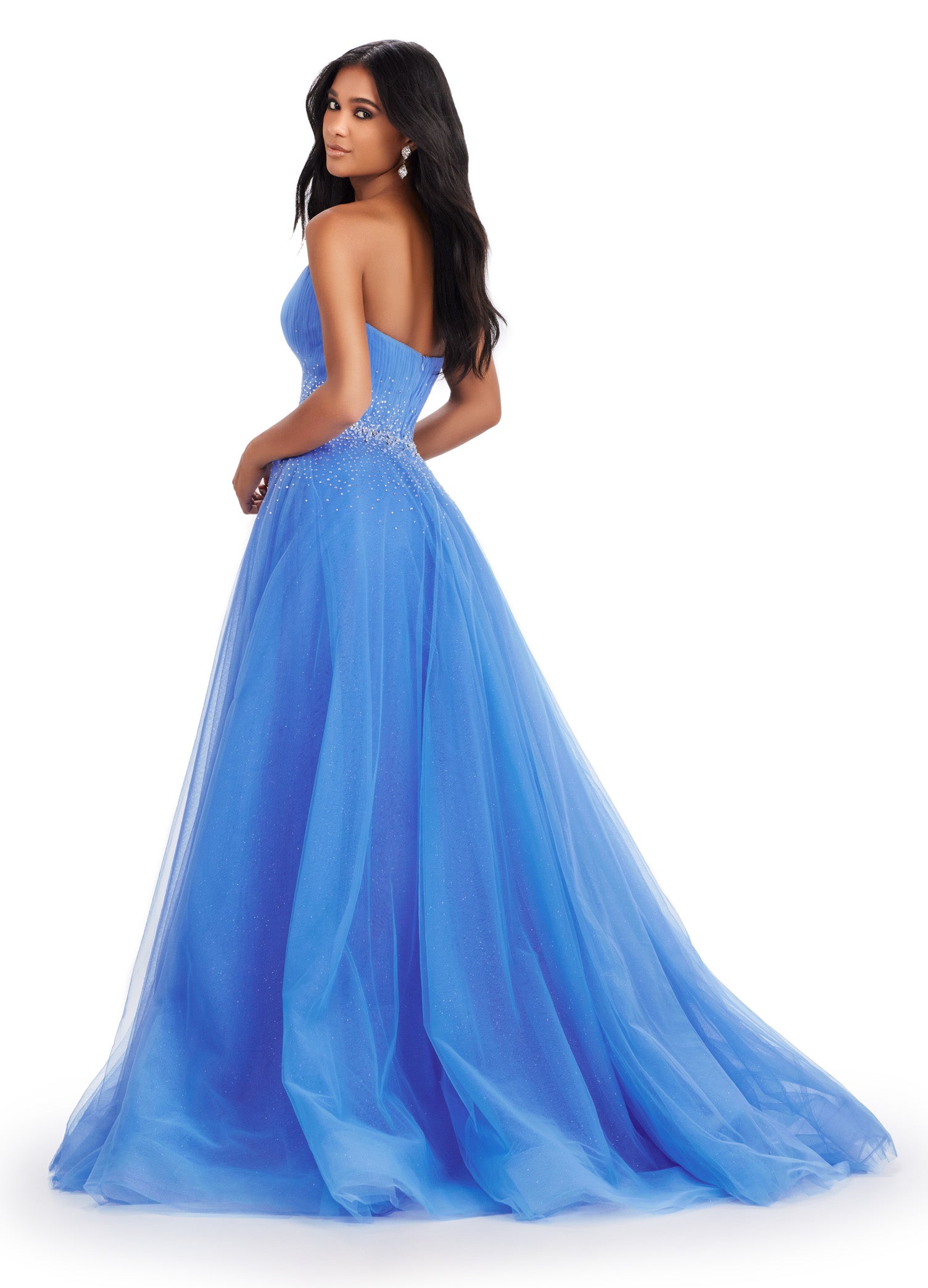 Expertly crafted by Ashley Lauren, this 11597 Long Prom Dress exudes timeless elegance. The strapless design coupled with glittery tulle creates a stunning ball gown silhouette. Adorned with a beautiful beaded belt, this formal pageant gown is a perfect choice for any special occasion. The perfect dress fit for a princess. This strapless glitter tulle ball gown features a beaded waist detail that'll be sure to make you sparkle at your next event!