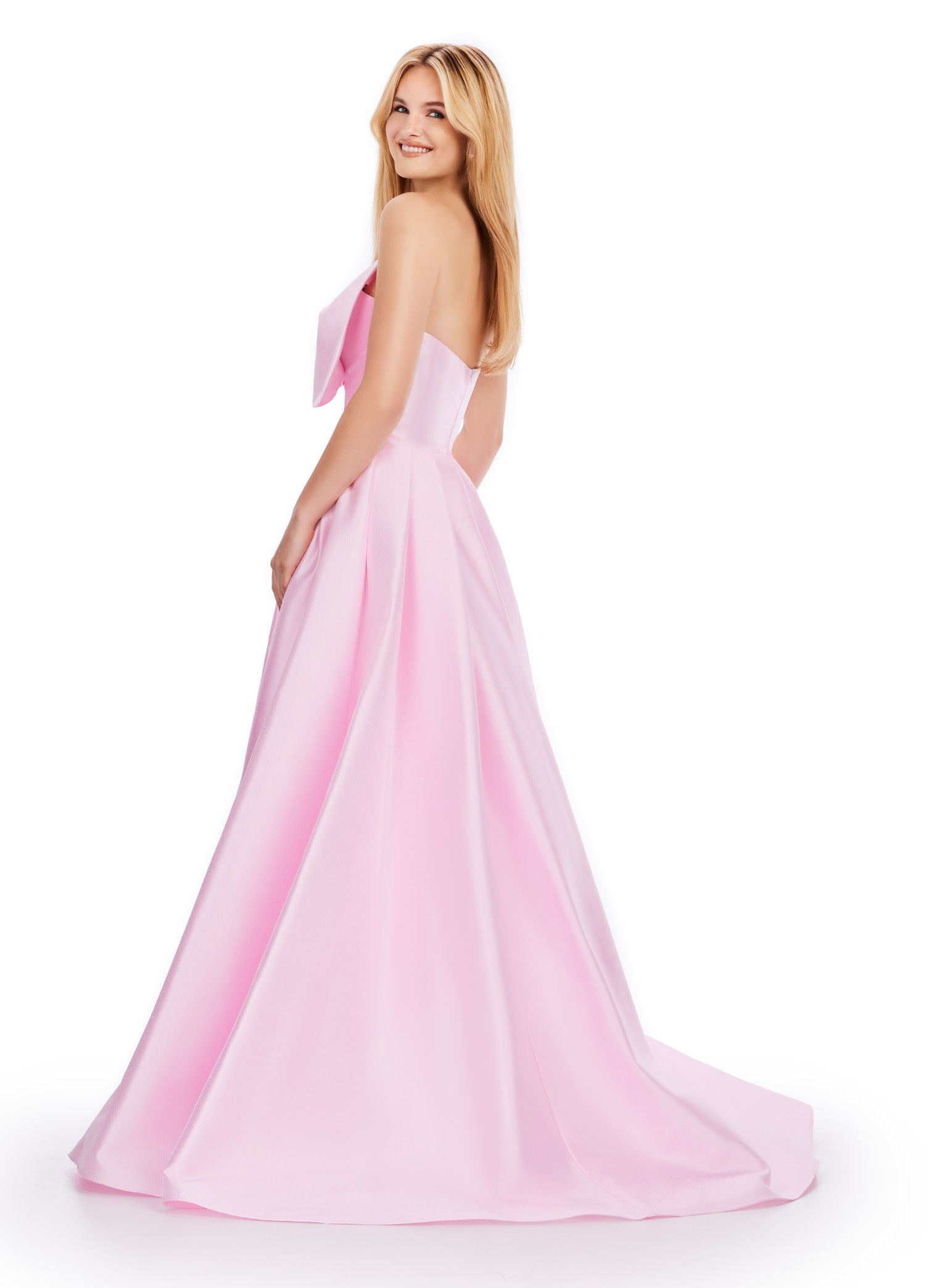 Discover the sophisticated elegance of the Ashley Lauren 11609 Long Prom Dress. Made with luxurious Mikado fabric, this strapless ball gown features an oversized bow for a dramatic touch. Perfect for formal events and pageants, this dress will make you feel like royalty with its timeless style and flattering silhouette. We love a bow moment! This strapless Mikado ball gown features an asymmetrical oversized bow with wrap skirt.