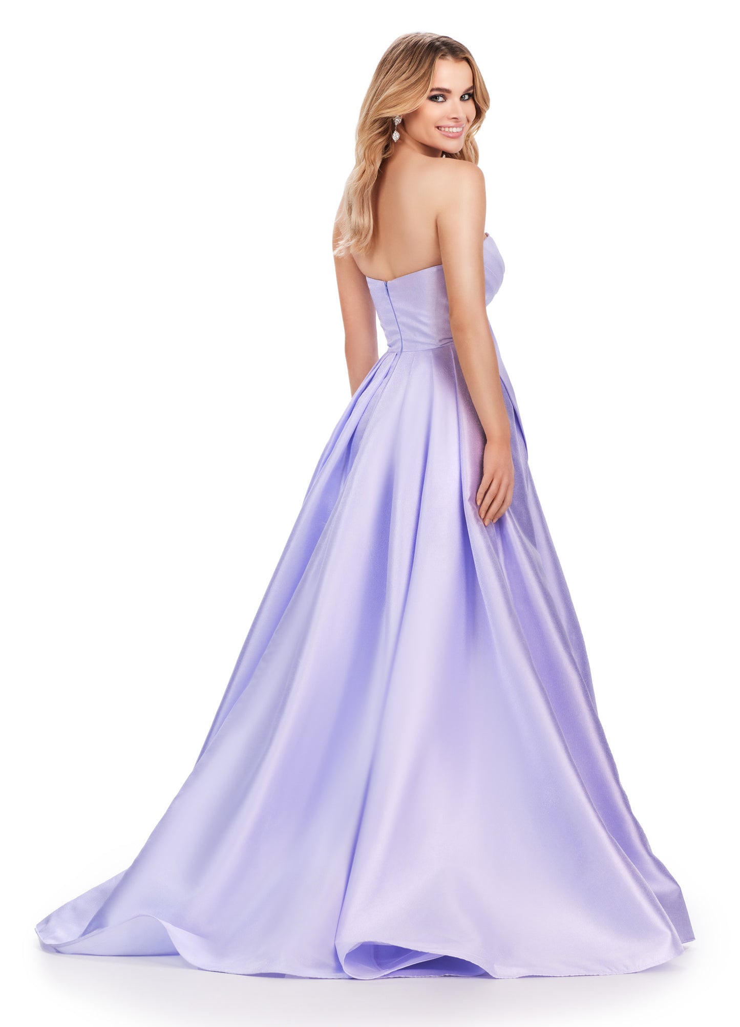 Discover the sophisticated elegance of the Ashley Lauren 11609 Long Prom Dress. Made with luxurious Mikado fabric, this strapless ball gown features an oversized bow for a dramatic touch. Perfect for formal events and pageants, this dress will make you feel like royalty with its timeless style and flattering silhouette. We love a bow moment! This strapless Mikado ball gown features an asymmetrical oversized bow with wrap skirt.