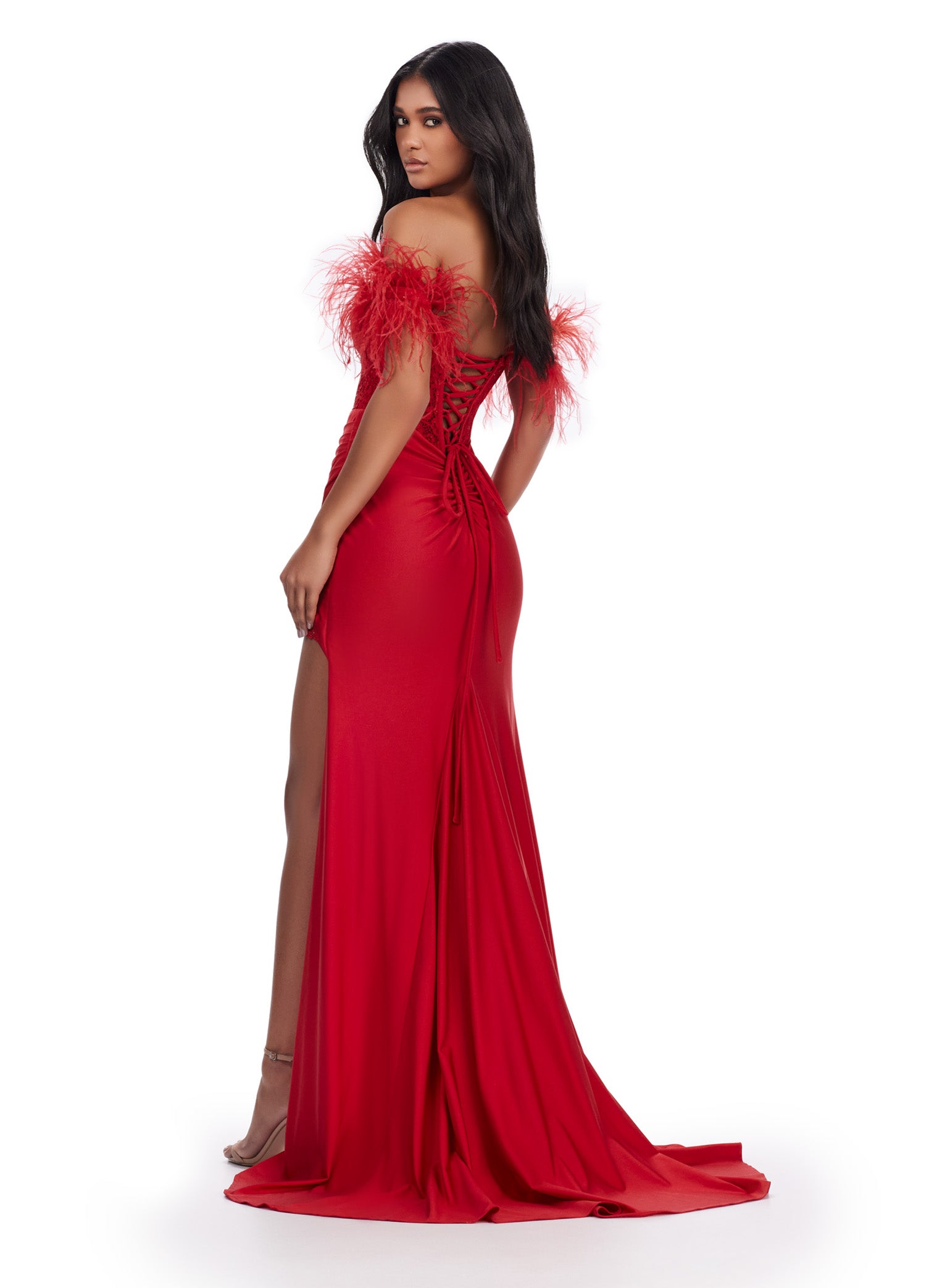 Stay on-trend with the Ashley Lauren 11618 Long Prom Dress. Featuring a corset, off-shoulder design, and intricate lace applique, this formal gown exudes elegance. The feather straps add a touch of whimsy, while the slit allows for effortless movement. Perfect for prom or pageants. Slay the night away in this fabulous embroidered jersey gown. This dress features a corset bustier with a lace up back and off shoulder feather straps.